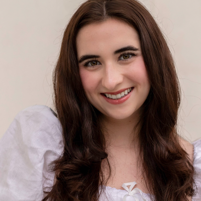 Taylor Crowell headshot against white background